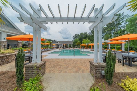 Sparkling swimming pool and spacious sundeck at The Oxmoor in Birmingham, AL